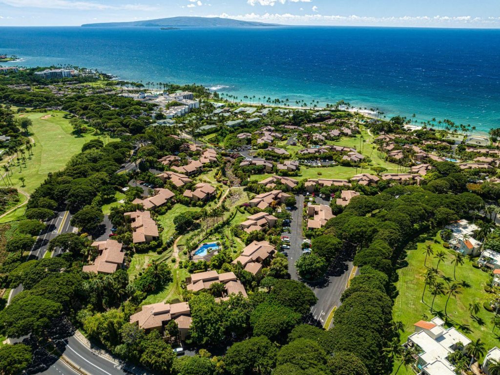 Aerial view of Wailea Ekahi condos in Wailea, Maui, with Keawakapu Beach and the Pacific Ocean in the background