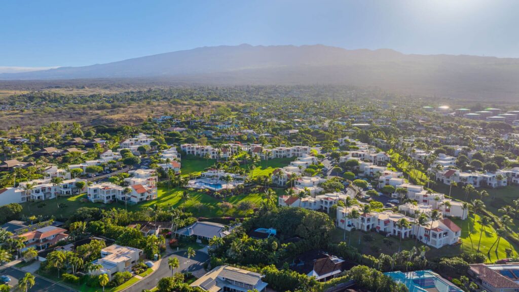 Aerial view of Wailea Palms residential condo community with ocean backdrop in Wailea, Maui