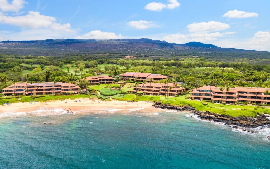 Aerial view of Makena Surf luxury beachfront condos located on Poʻolenalena Beach in Makena, Maui